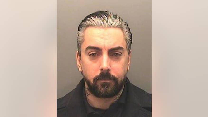 ian watkins mug shot.jpg